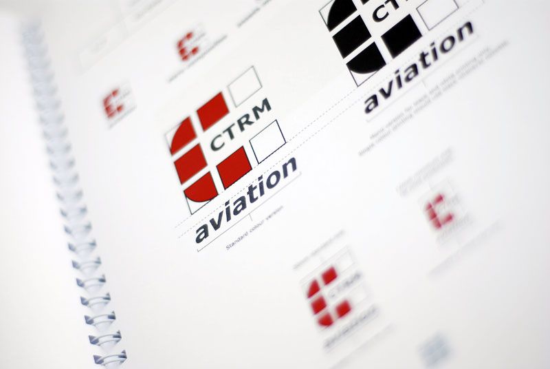 Pages of a brand identity manual